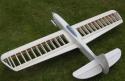 Scratch built with fuselage flaps and tail plane covered in glasscloth and coated with epoxy resin prior to finishing.