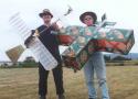 Dare to be different. 
Reeve Marsh (left) with his flying broomstick and Frank McPherson (right) with his oddity made from Victoria Bitter beer cartons.
