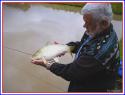 Real name Jim Hatch
Fish is a small carp caught on a local water.